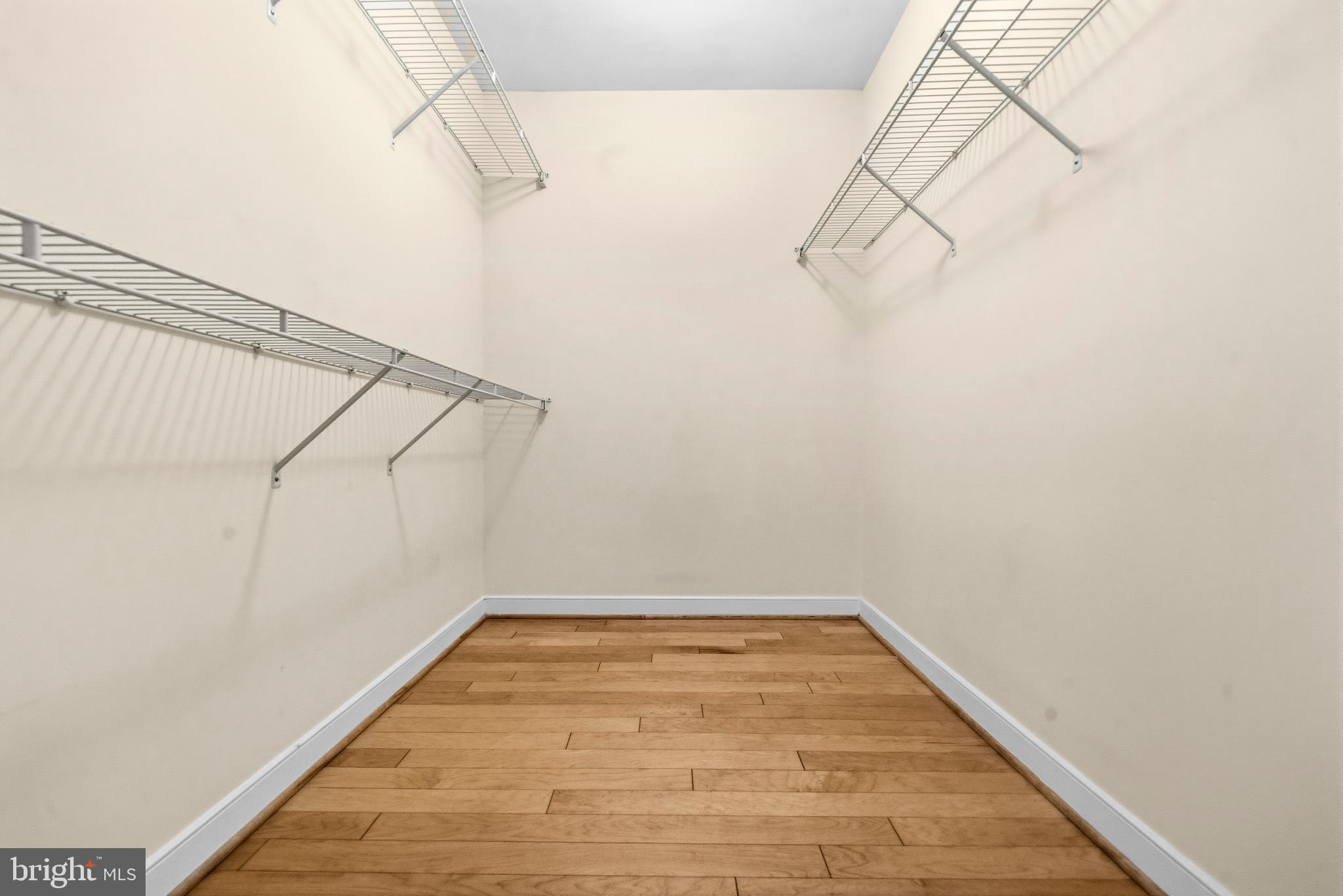 631 D Street Northwest, Unit 733 Washington, DC 20004 - Photo 26 of 100 a view of a room with racks on the wall