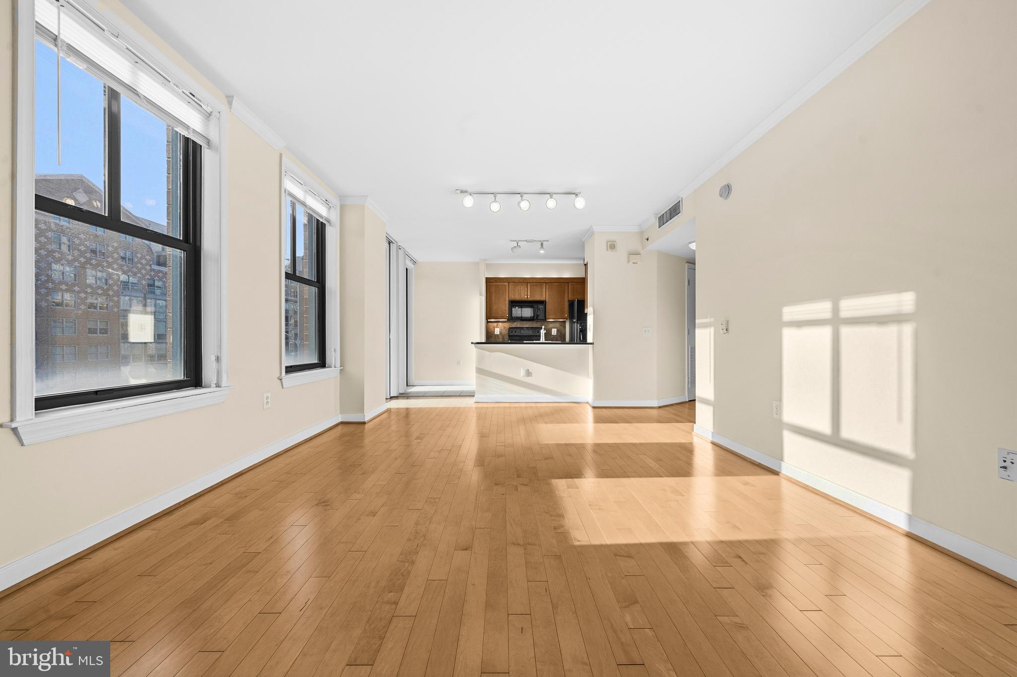 631 D Street Northwest, Unit 733 Washington, DC 20004 - Photo 3 of 100 a view of an entryway with wooden floor
