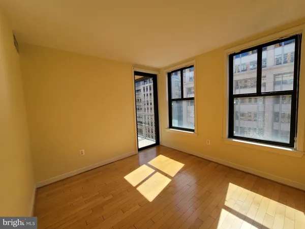 a view of a building with glass door