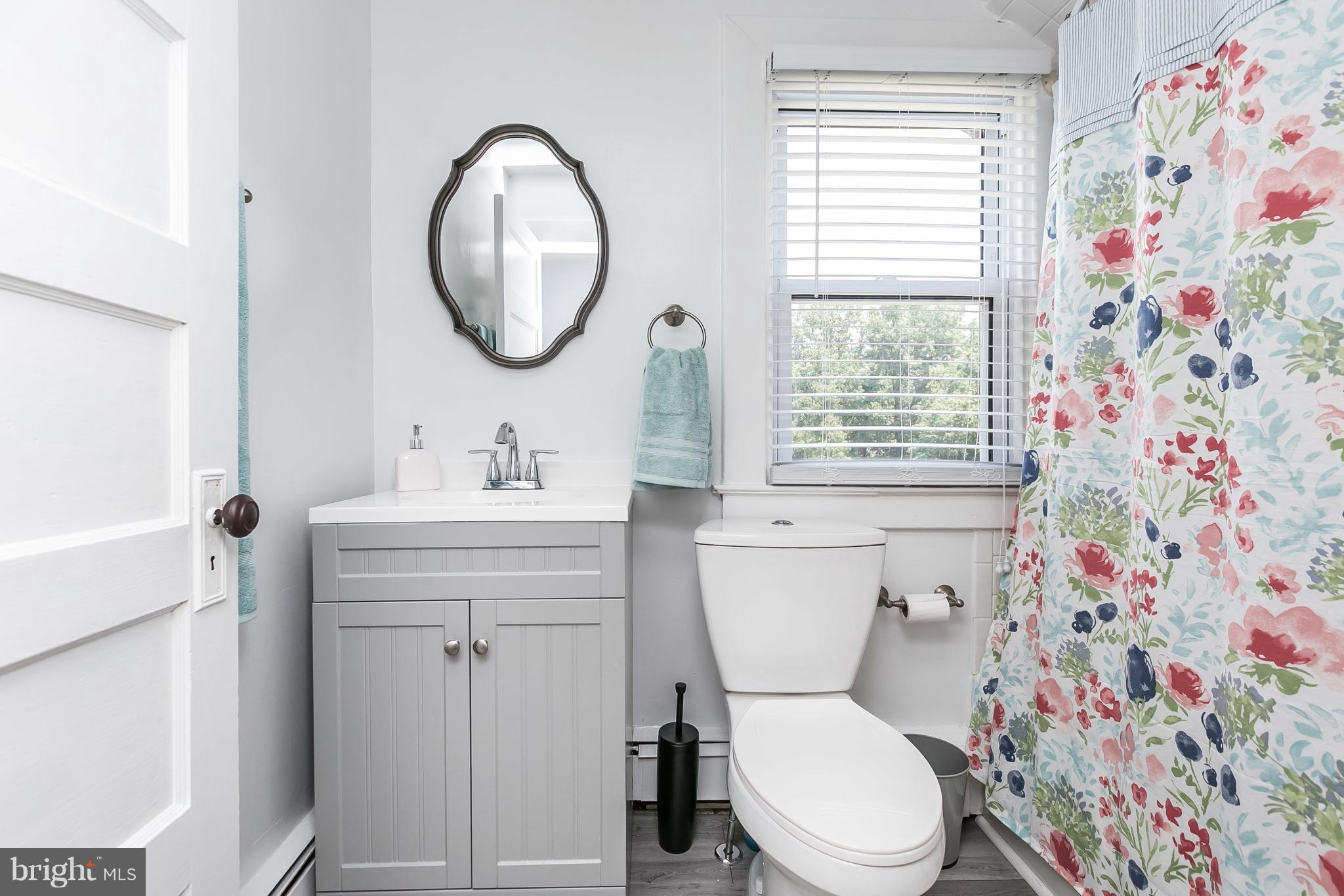 801 Woodsdale Road Baltimore, MD 21228 - Photo 18 of 29 Remodeled Bath