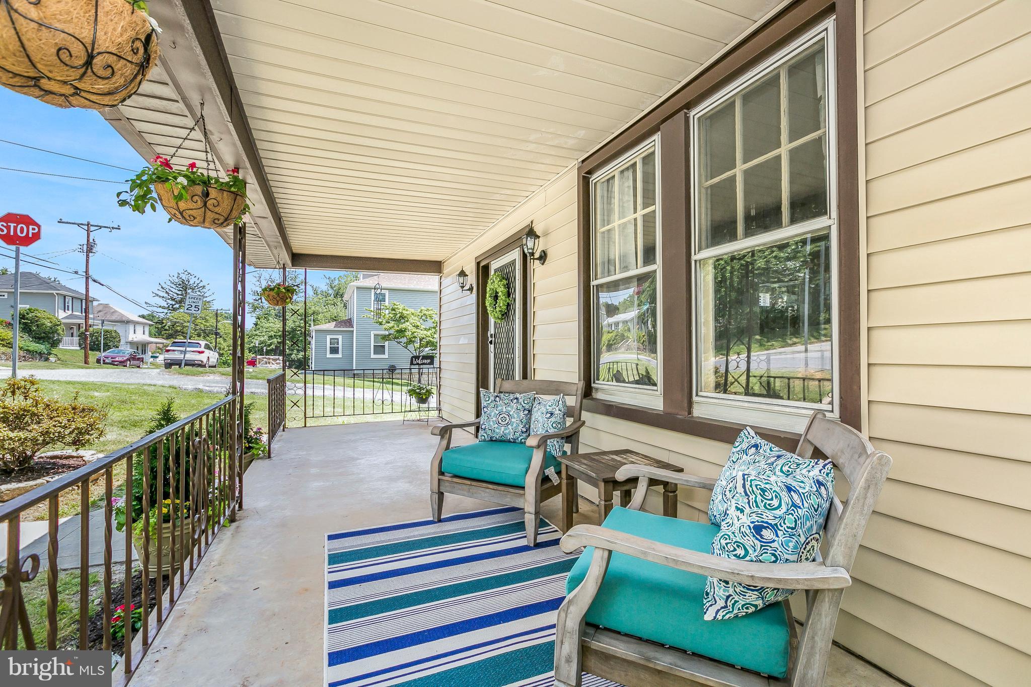 801 Woodsdale Road Baltimore, MD 21228 - Photo 23 of 29 Covered front porch Great spot to relax