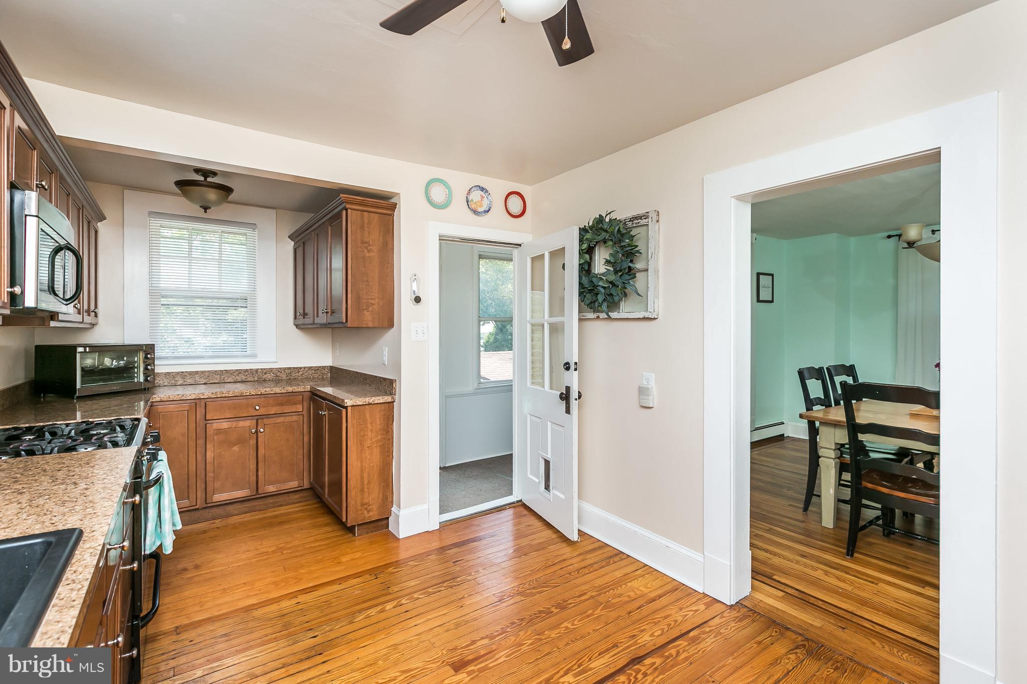 801 Woodsdale Road Baltimore, MD 21228 - Photo 8 of 29 Kitchen access to Mud Room & back porch