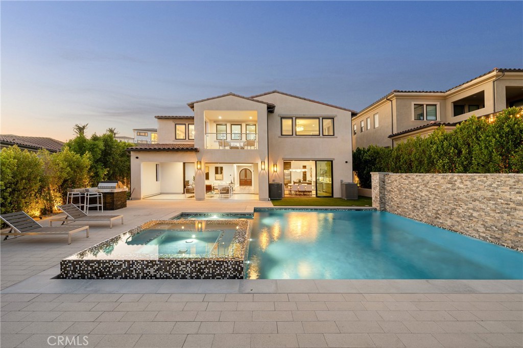 20436 Liverpool Way Porter Ranch, CA 91326 - Photo 1 of 1 a swimming pool with outdoor seating and yard