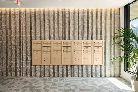 a view of a kitchen with furniture a ceiling fan and window