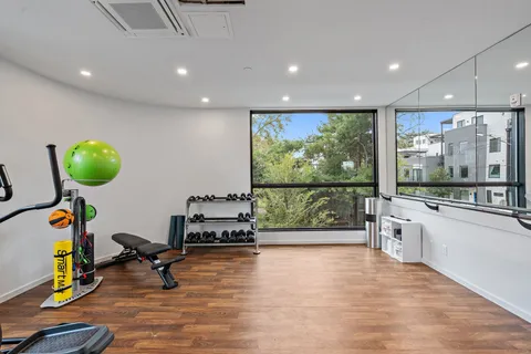 a view of a room with gym equipment