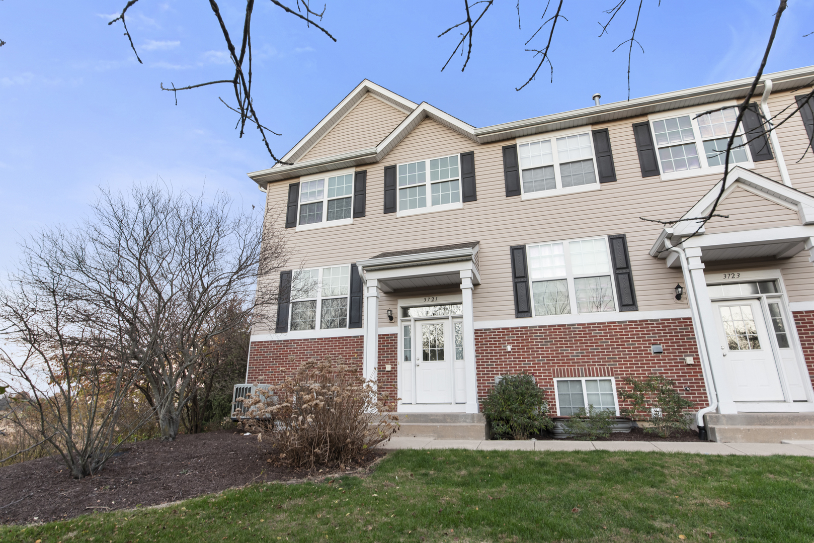 3721 Bailey Road Yorkville, IL 60560 - Photo 1 of 18 a front view of a house with a yard