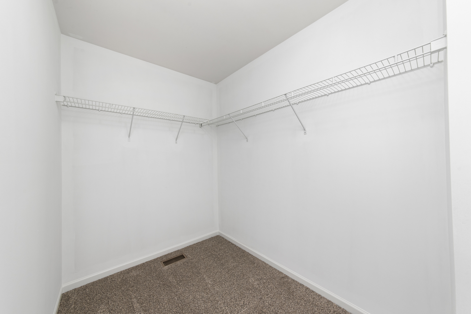 3721 Bailey Road Yorkville, IL 60560 - Photo 11 of 18 a view of a room with racks on the wall
