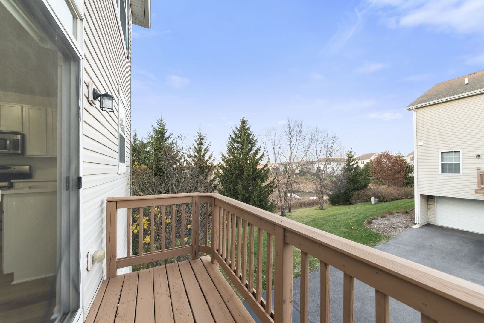 3721 Bailey Road Yorkville, IL 60560 - Photo 17 of 18 a view of a wooden deck with a yard