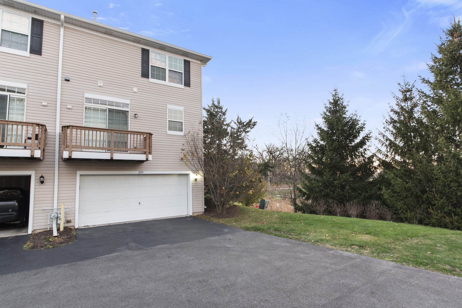 3721 Bailey Road Yorkville, IL 60560 - Photo 18 of 18 a front view of a house with a garage