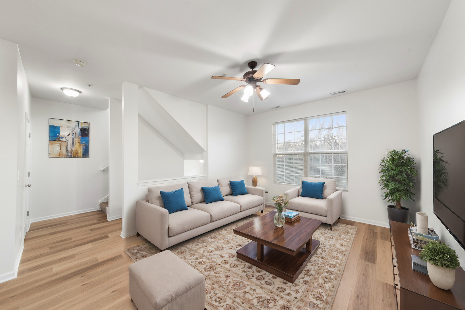 3721 Bailey Road Yorkville, IL 60560 - Photo 6 of 18 a living room with furniture or couch and a flat screen tv