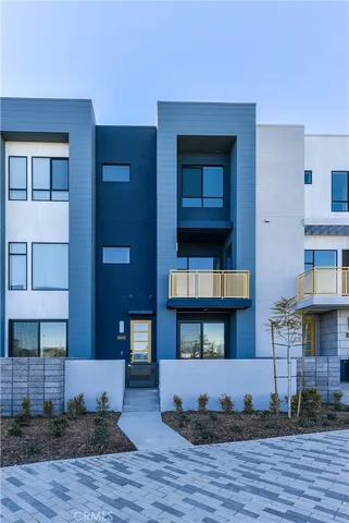a view of kitchen with furniture and wooden floor