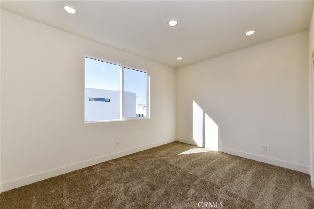 16432 Compass Avenue Tustin, CA 92782 - Photo 23 of 35 an empty room with windows