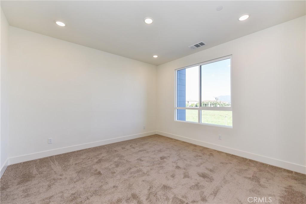 16432 Compass Avenue Tustin, CA 92782 - Photo 27 of 35 an empty room with a window