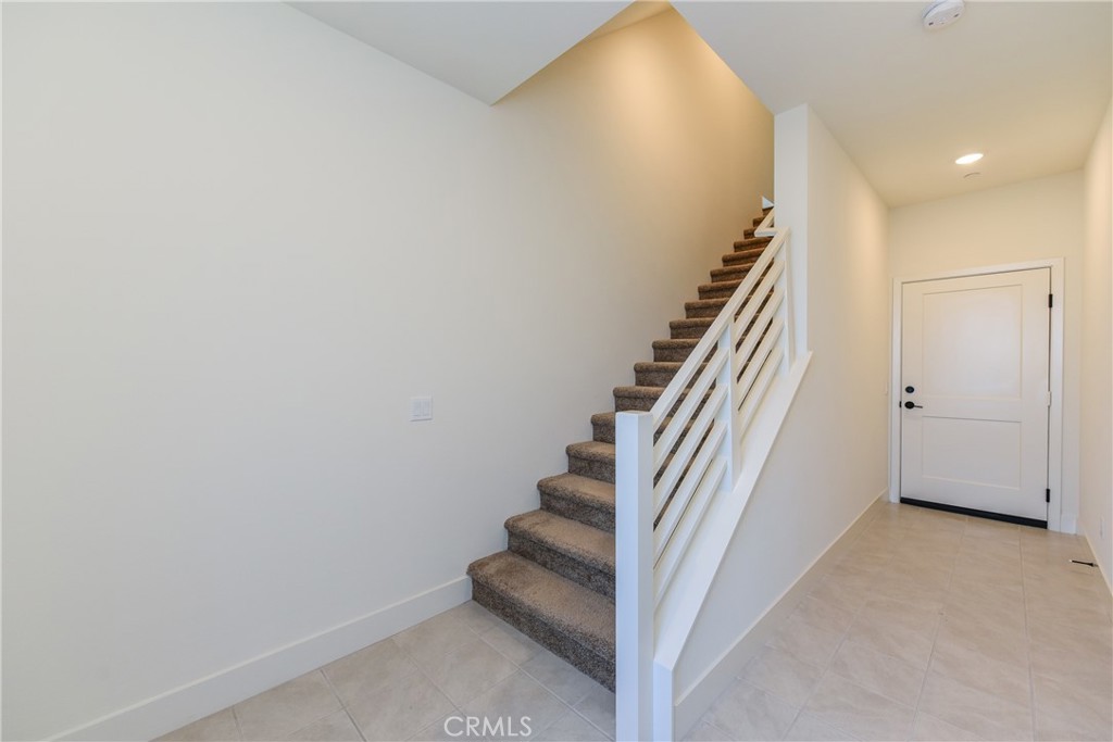 16432 Compass Avenue Tustin, CA 92782 - Photo 9 of 35 a view of entryway with stairs
