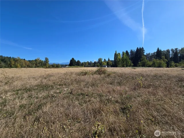 a view of mountain with sunset view