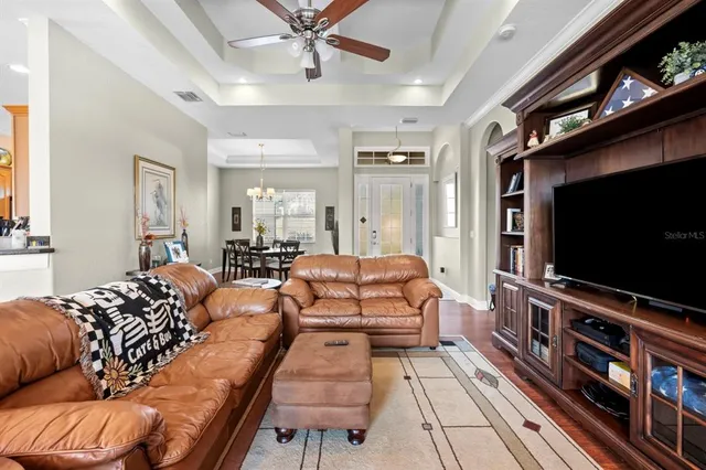 a view of a dining room with furniture and window