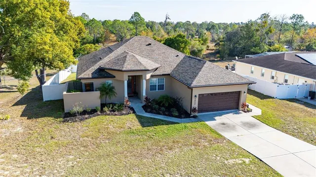 front view of a house with a yard