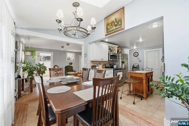 a view of a dining area with furniture window and wooden floor