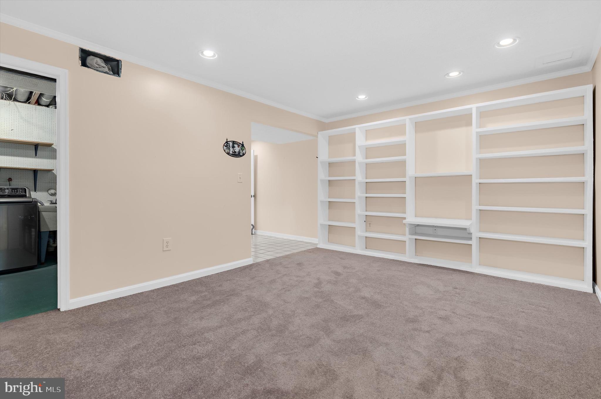 9221 Bellbeck Road Baltimore, MD 21234 - Photo 28 of 48 Lower level family room with built ins