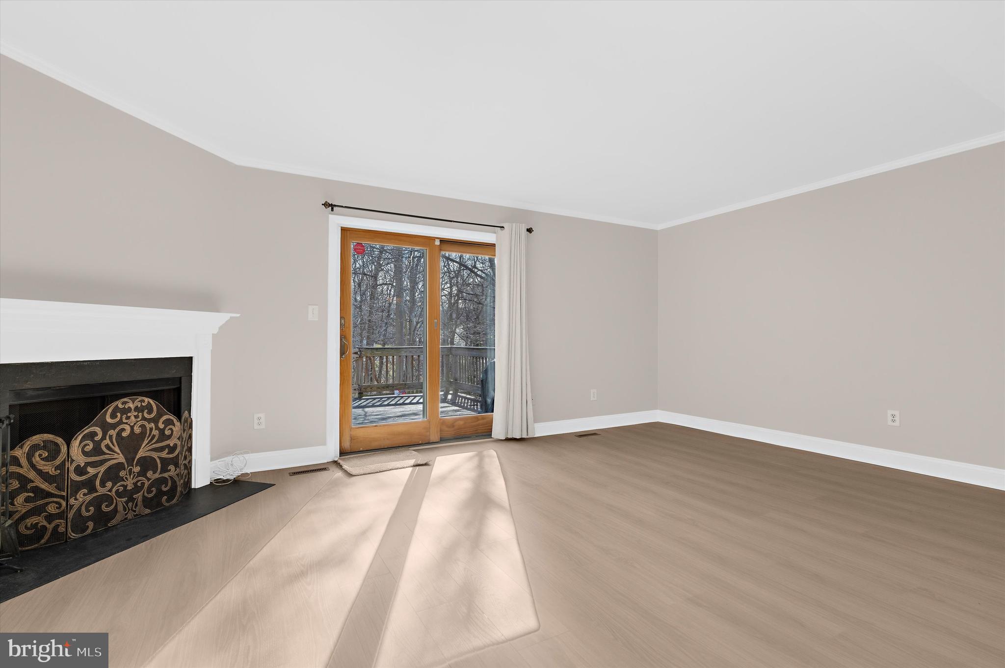 9221 Bellbeck Road Baltimore, MD 21234 - Photo 4 of 48 Spacious living room with sliders