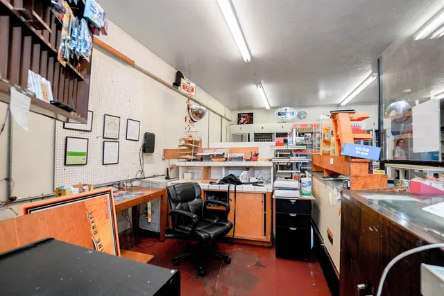 a view of a kitchen with furniture and a kitchen