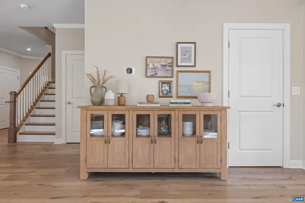 a kitchen with stainless steel appliances a refrigerator and a stove top oven