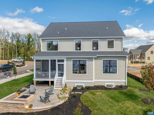 a aerial view of a house with a yard