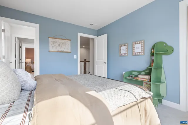 a view of a workspace with furniture and wooden floor