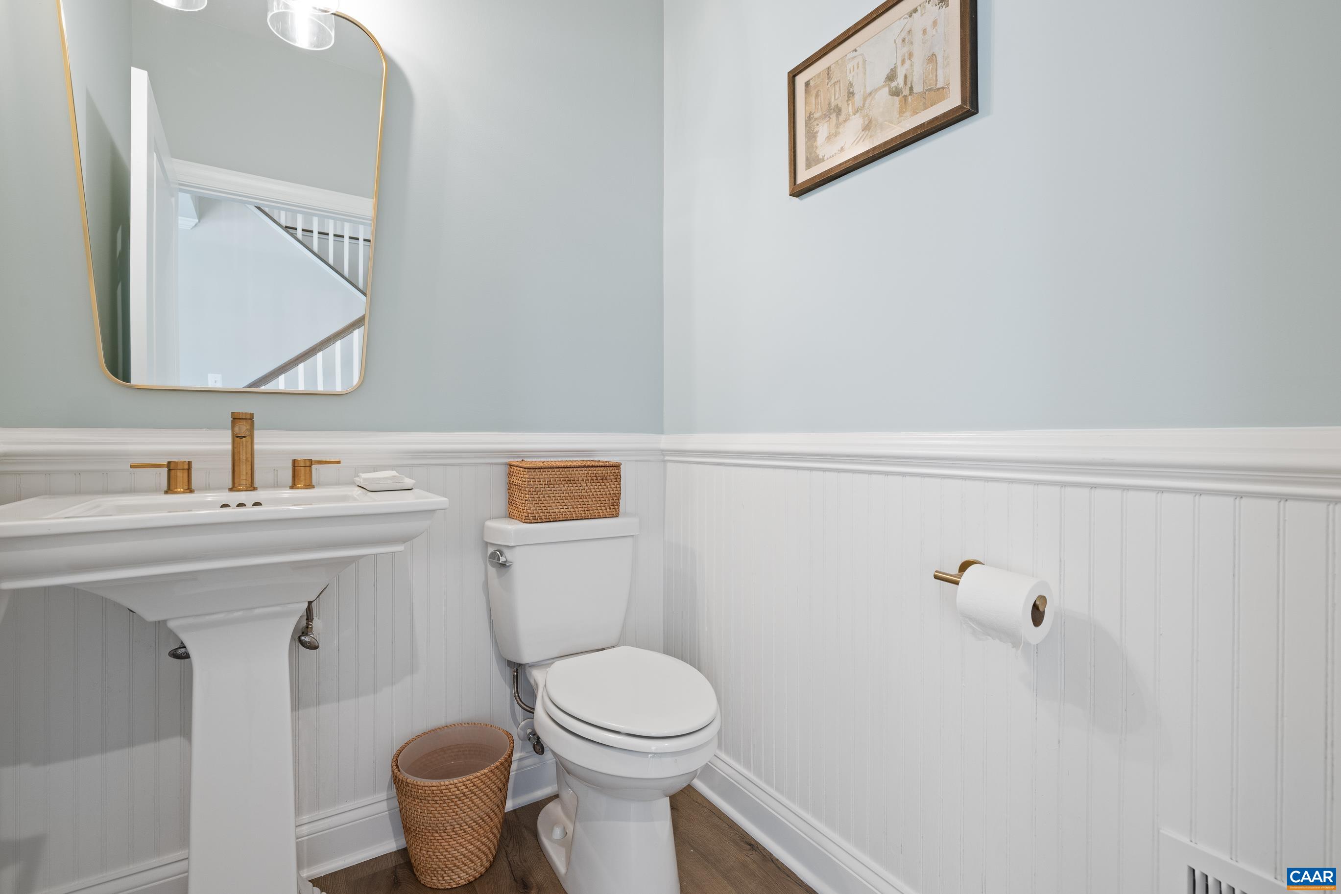 34 F Fowler Street Charlottesville, VA 22901 - Photo 10 of 68 a bathroom with a toilet sink and mirror