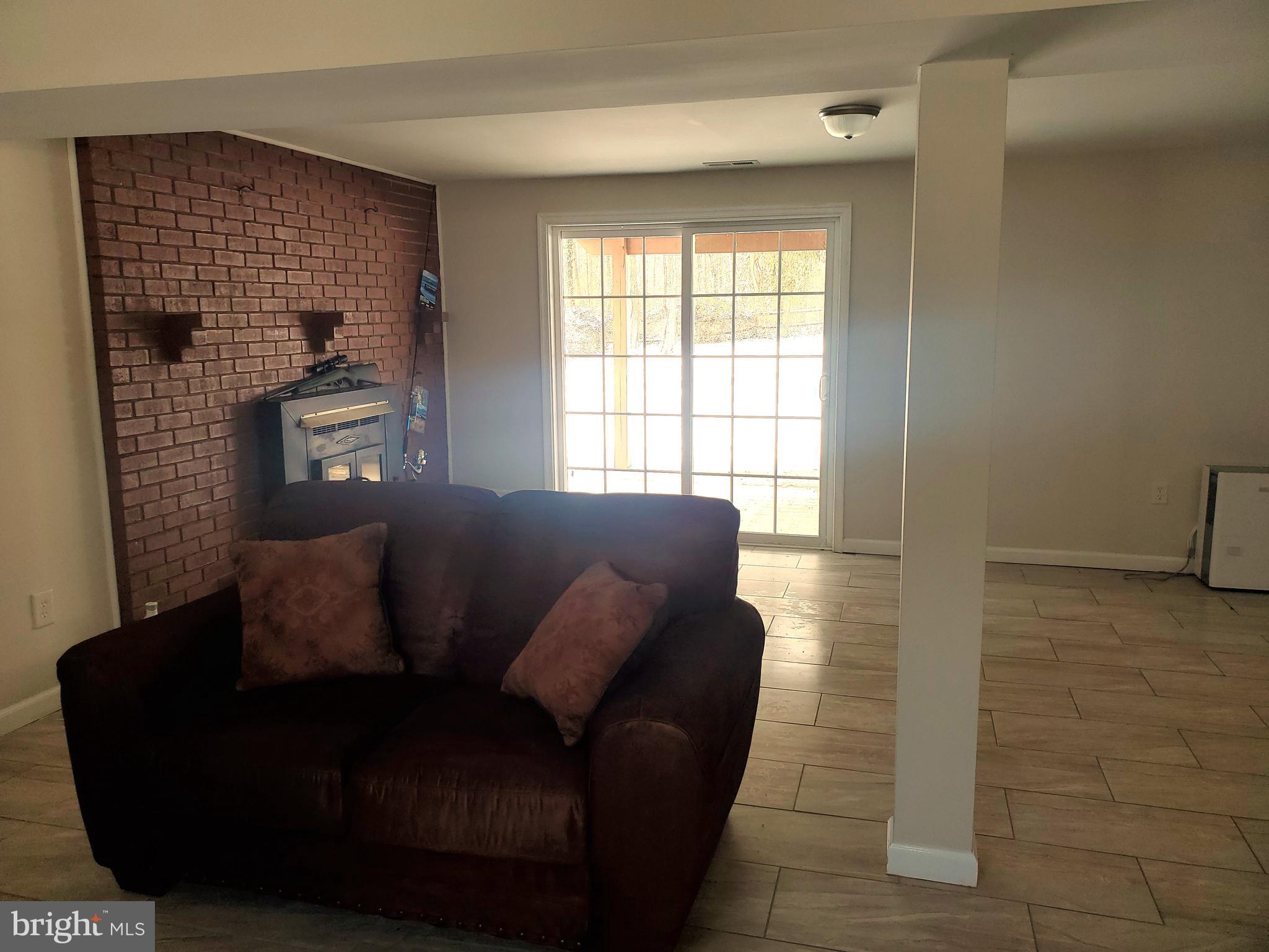 30 Colonial Circle North East, MD 21901 - Photo 11 of 15 a living room with furniture and a window