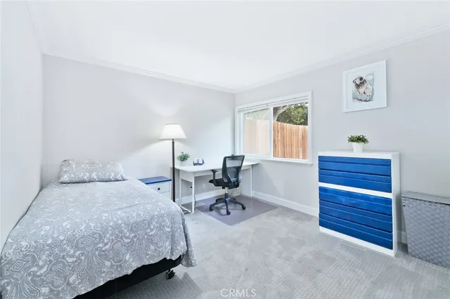 a view of an outdoor space with porch and windows