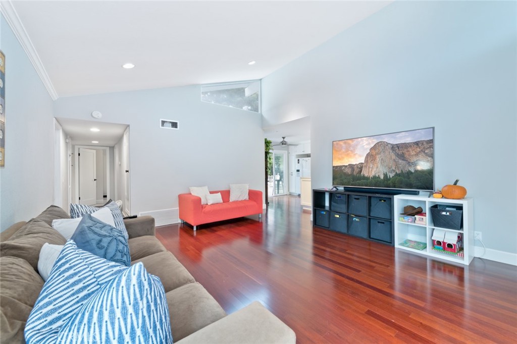 19292 Sierra Perla Road Irvine, CA 92603 - Photo 5 of 21 a living room with furniture and a flat screen tv