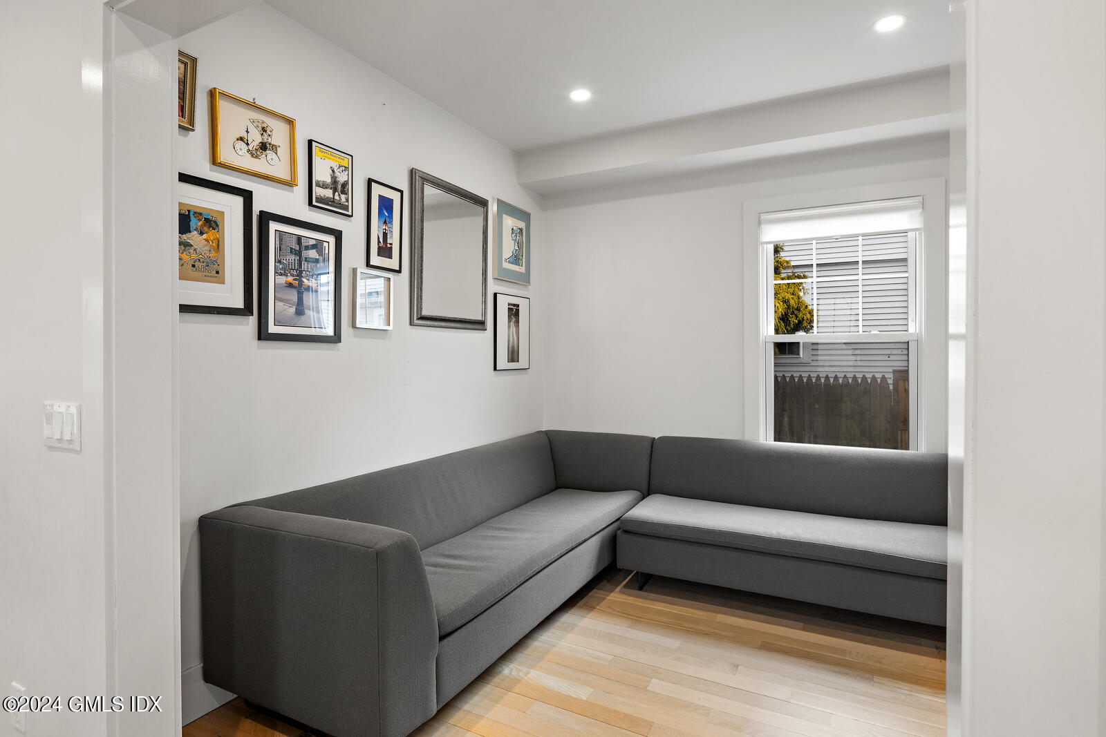 15 Elm Place Greenwich, CT 06830 - Photo 15 of 40 a living room with furniture and a window