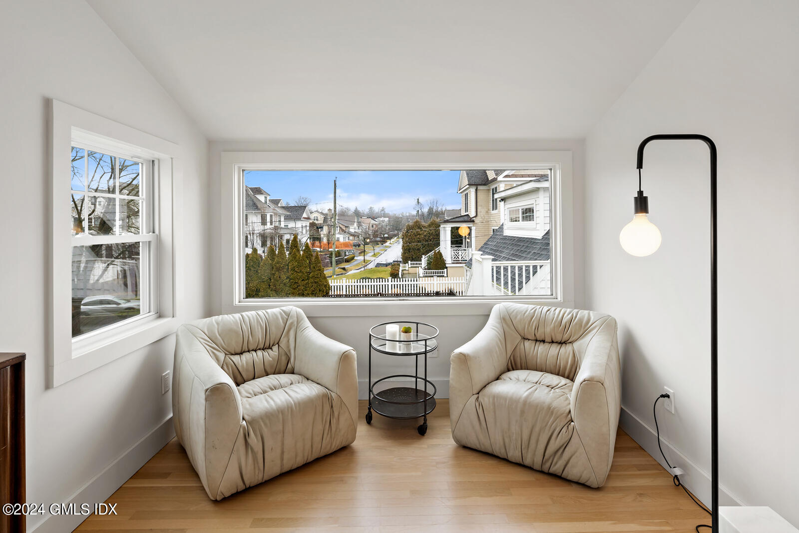 15 Elm Place Greenwich, CT 06830 - Photo 17 of 40 a living room with furniture and a large window