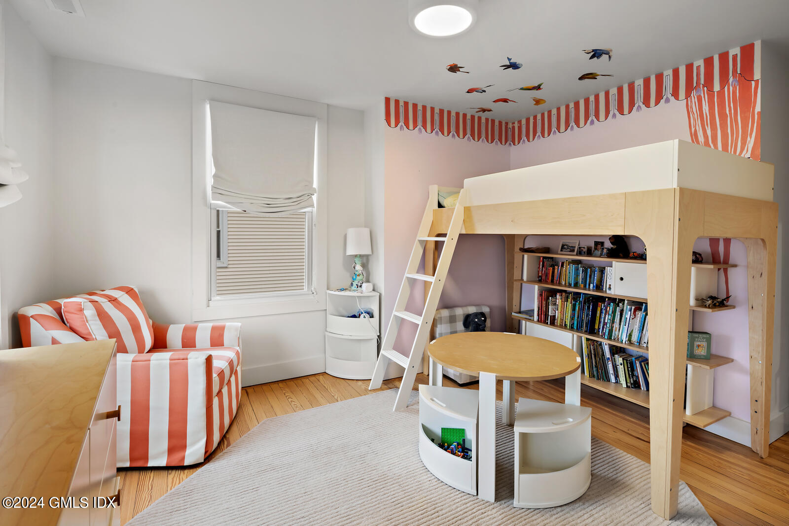 15 Elm Place Greenwich, CT 06830 - Photo 22 of 40 a living room with a couch and a table in it