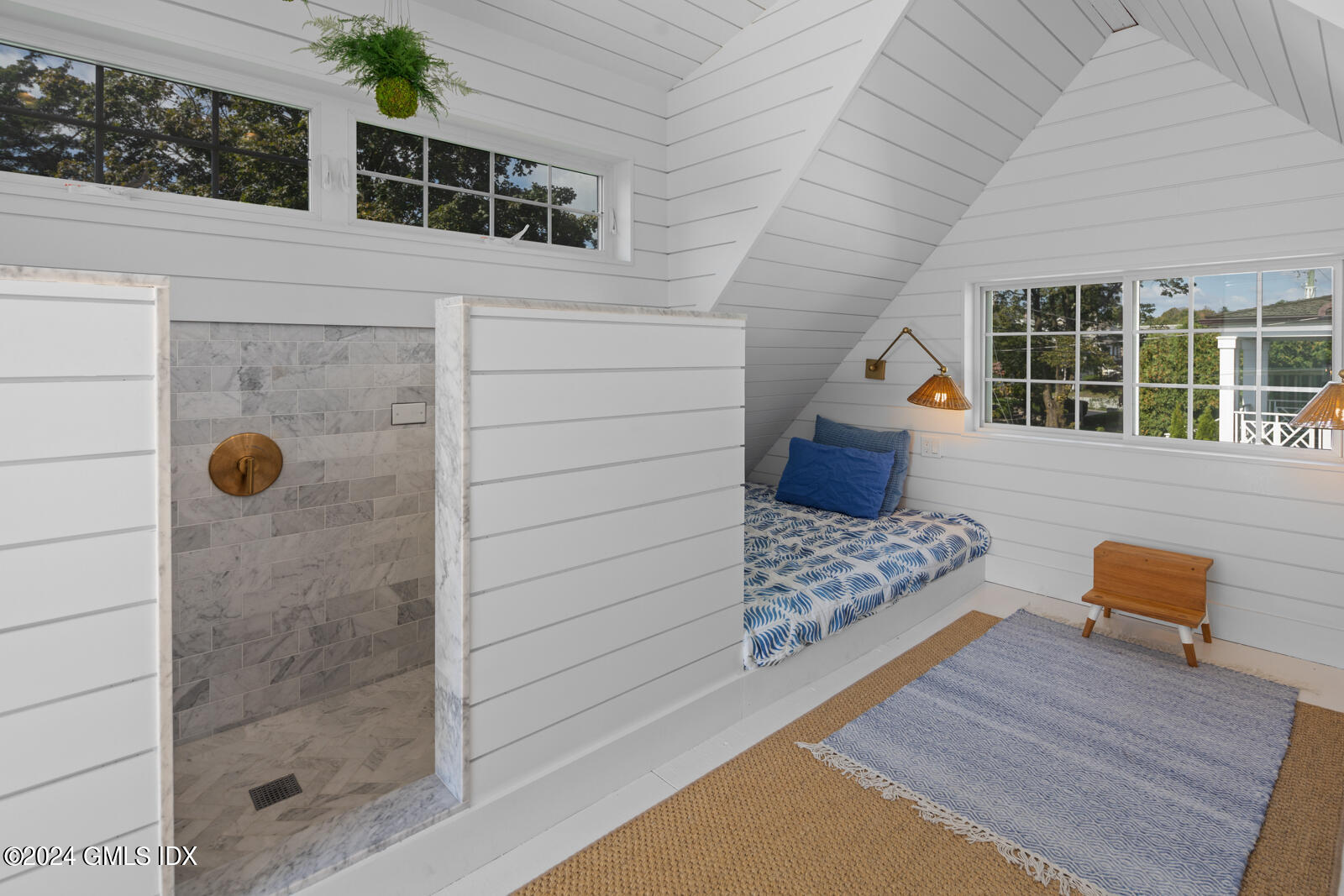 15 Elm Place Greenwich, CT 06830 - Photo 28 of 40 a backyard of a house with outdoor seating