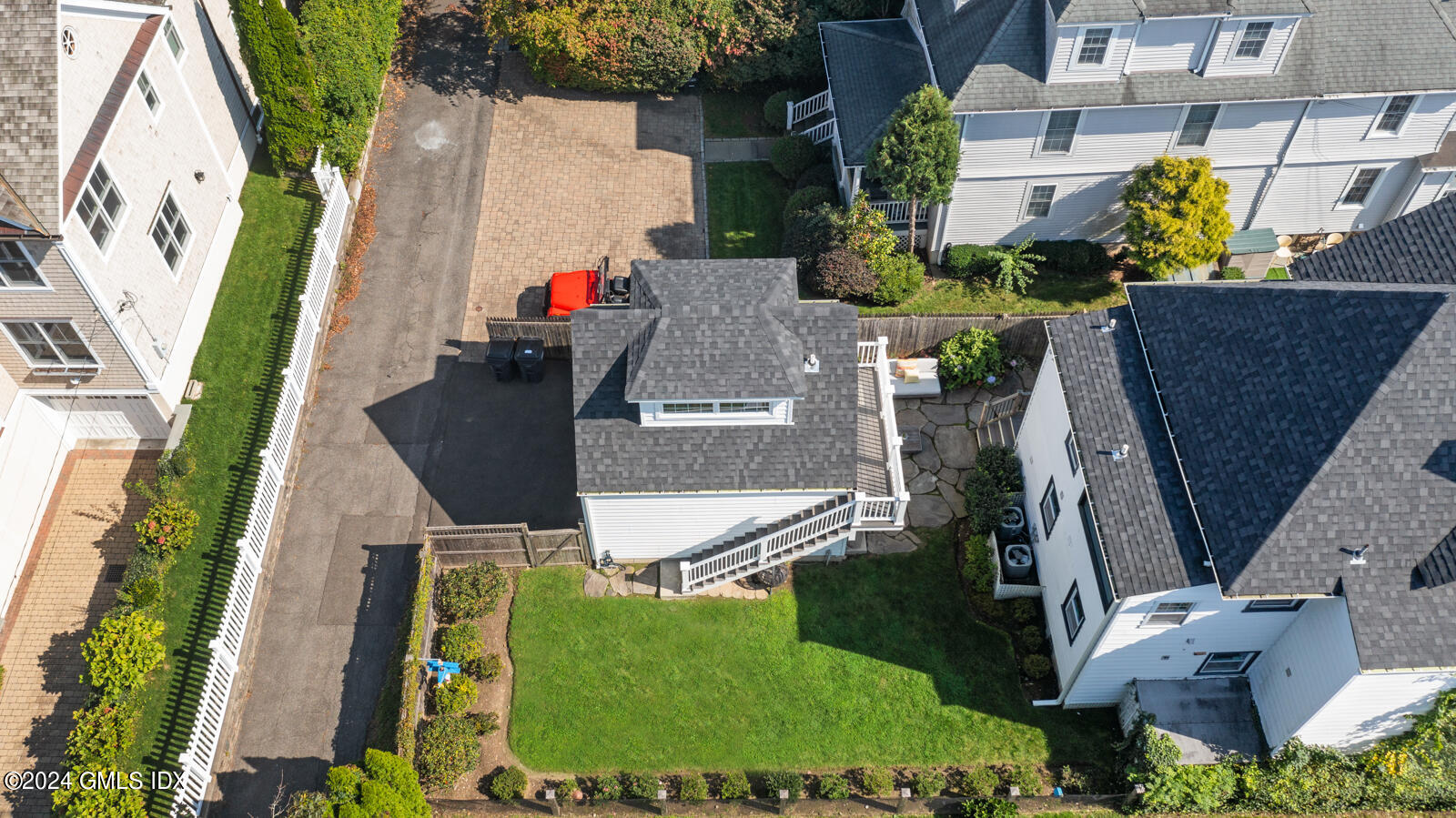 15 Elm Place Greenwich, CT 06830 - Photo 37 of 40 an aerial view of a house with outdoor space and a large tree