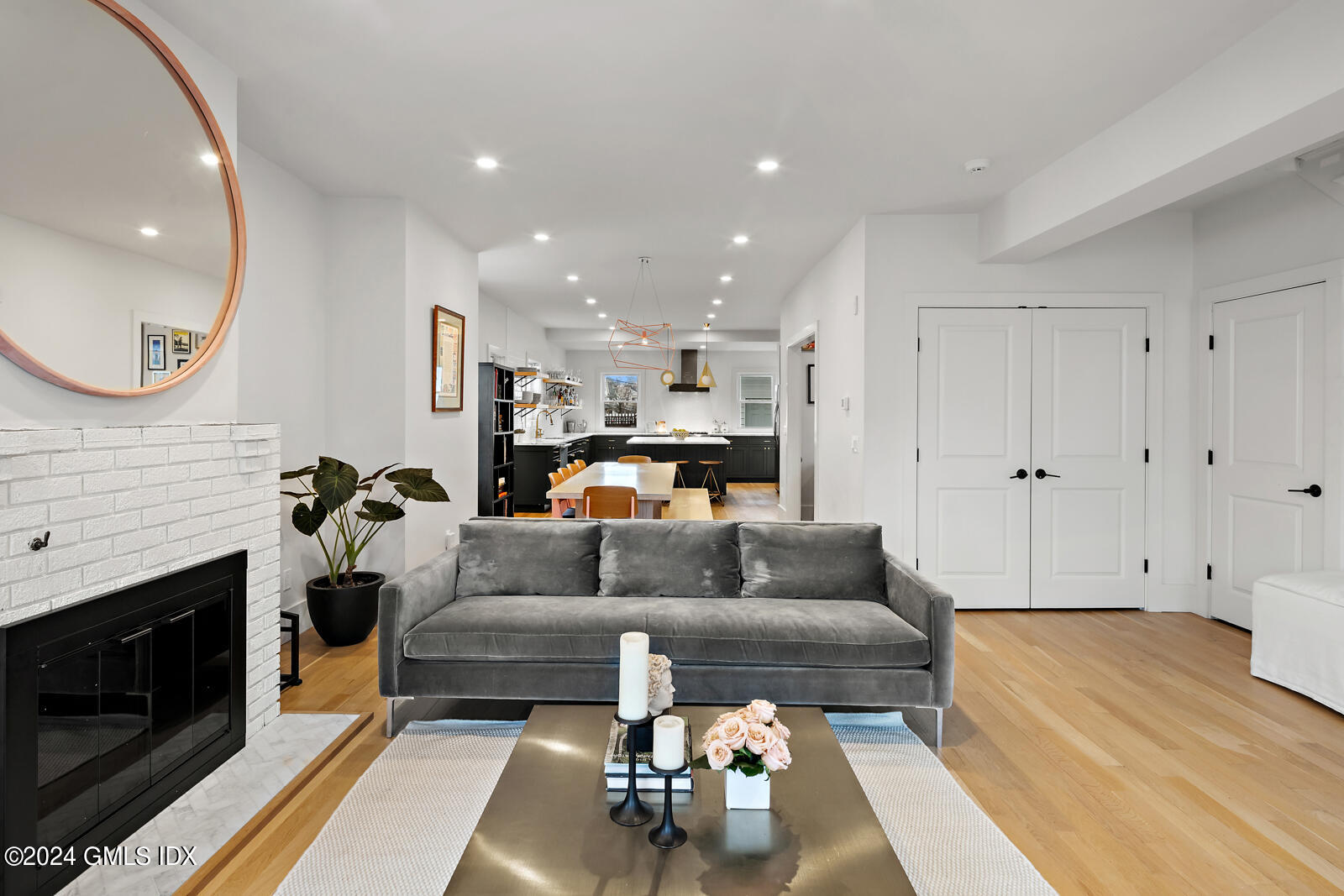 15 Elm Place Greenwich, CT 06830 - Photo 8 of 40 a living room with furniture and a fireplace