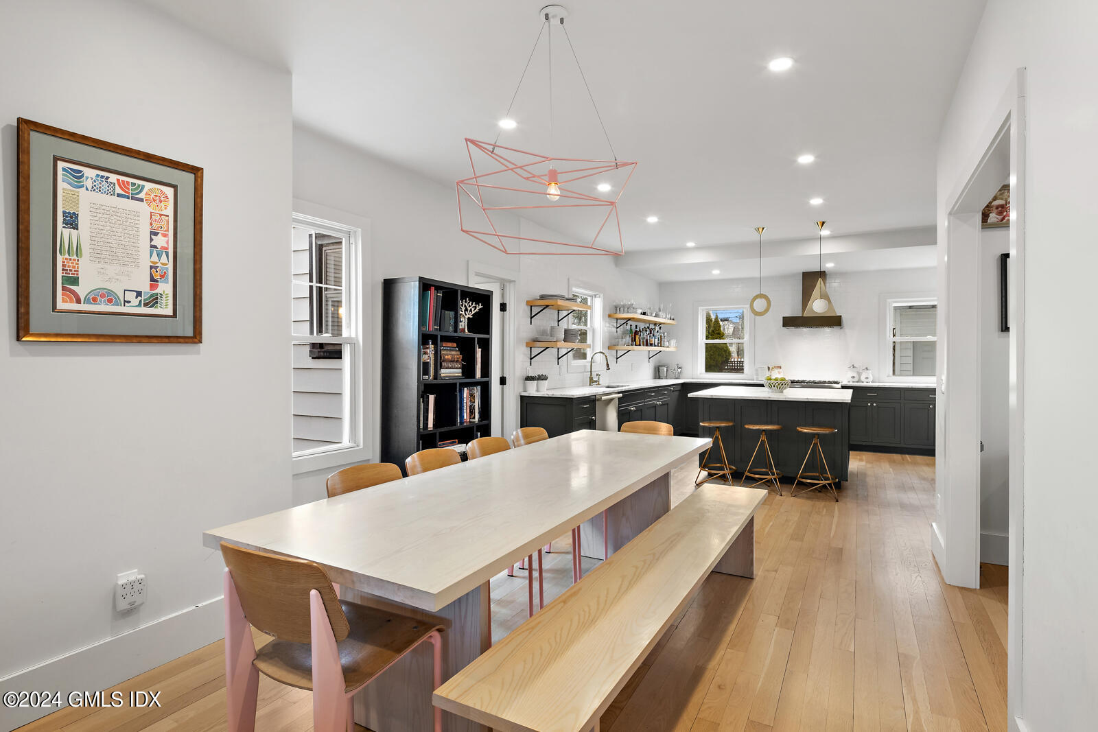15 Elm Place Greenwich, CT 06830 - Photo 9 of 40 a living room with stainless steel appliances kitchen island a table and chairs