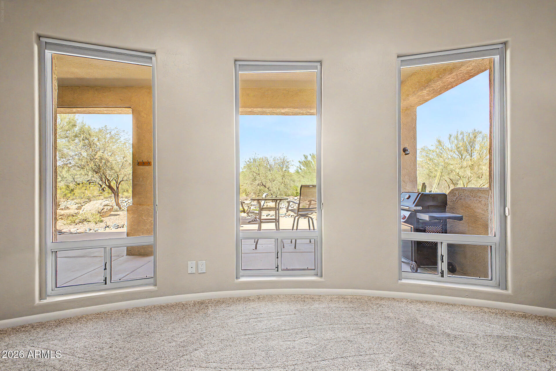 27909 North Quail Spring Road Rio Verde, AZ 85263 - Photo 16 of 52 an empty room with a window