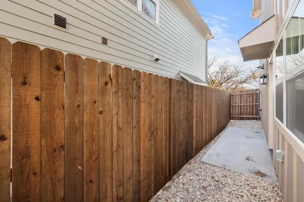 a view of a wooden fence