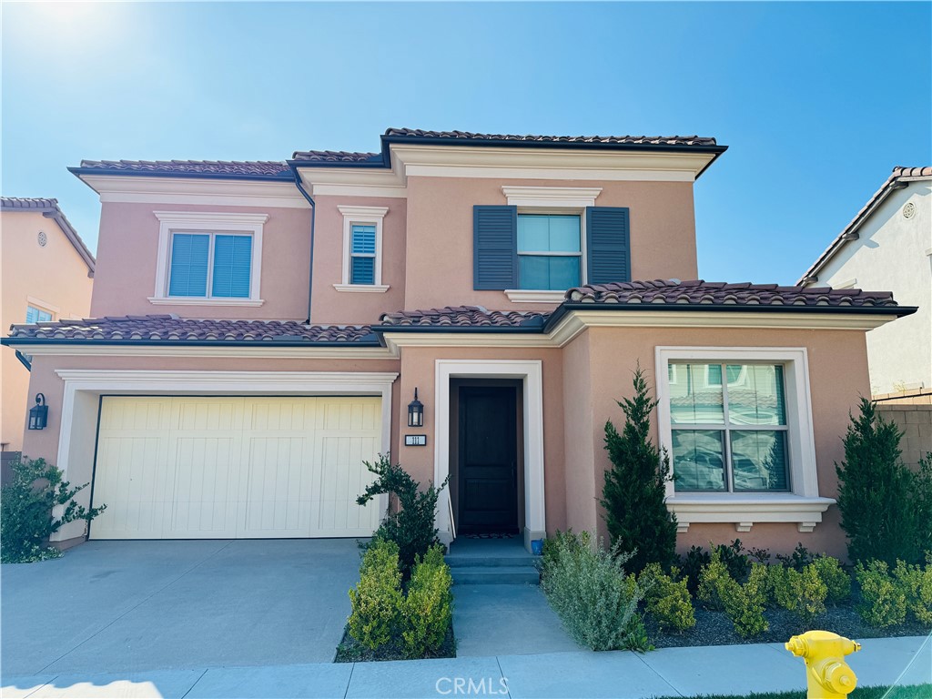 111 Abalone Irvine, CA 92620 - Photo 1 of 1 a front view of a house with plants