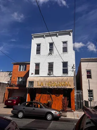 a view of a car park in front of a building
