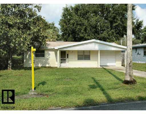 6829 River Road New Port Richey, FL 34652 - Photo 1 of 1 a view of a house with backyard and garden