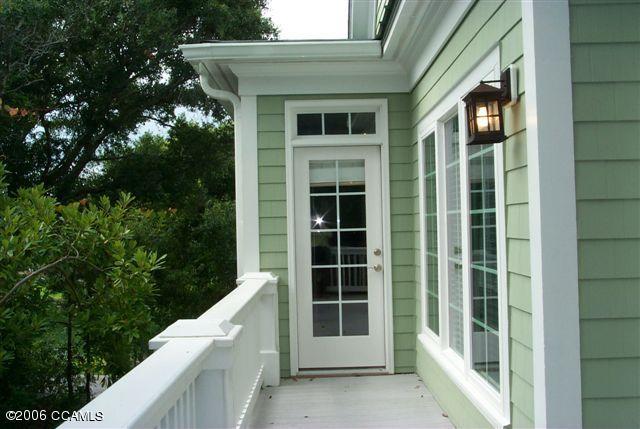 567 Coral Ridge Road Pine Knoll Shores, NC 28512 - Photo 19 of 29 SIDE PORCH/PRINCIPAL BEDROOM