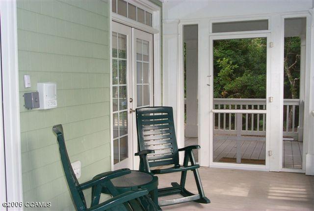 567 Coral Ridge Road Pine Knoll Shores, NC 28512 - Photo 27 of 29 SCREENED PORCH