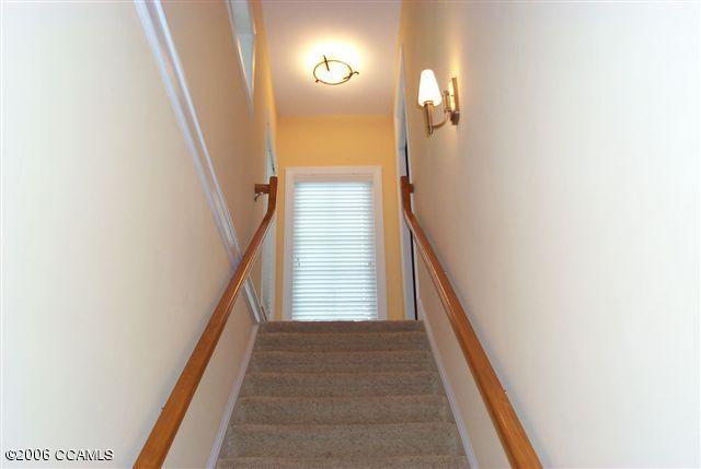 567 Coral Ridge Road Pine Knoll Shores, NC 28512 - Photo 6 of 29 STAIRWELL GOING UP