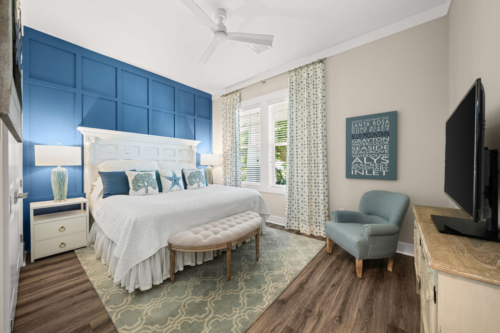 40 Tamoka Ct Inlet Beach Inlet Beach, FL 32461 - Photo 26 of 93 a spacious bedroom with a bed and a couch