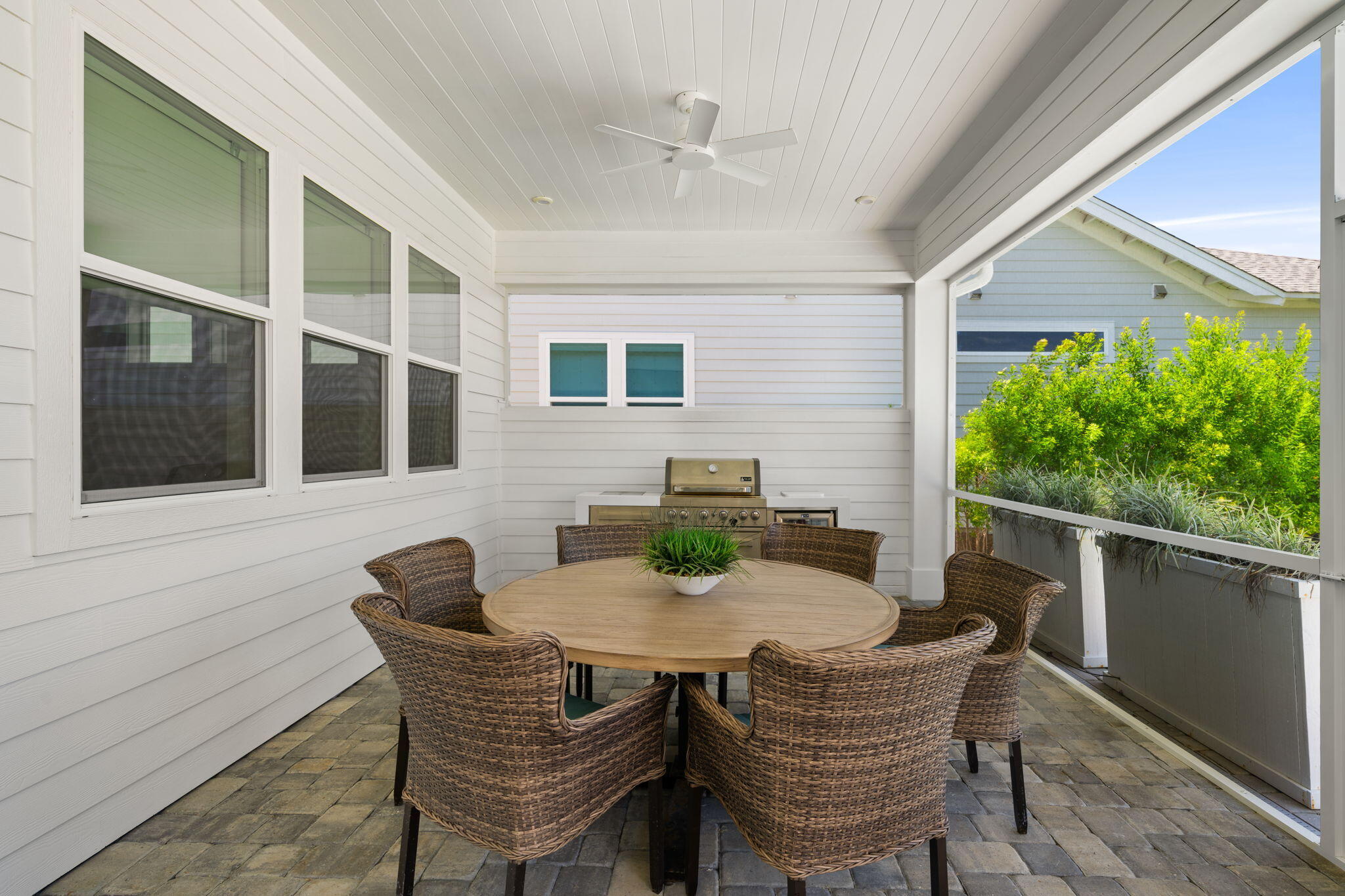 40 Tamoka Ct Inlet Beach Inlet Beach, FL 32461 - Photo 37 of 93 a view of a house that has a table and chairs in patio