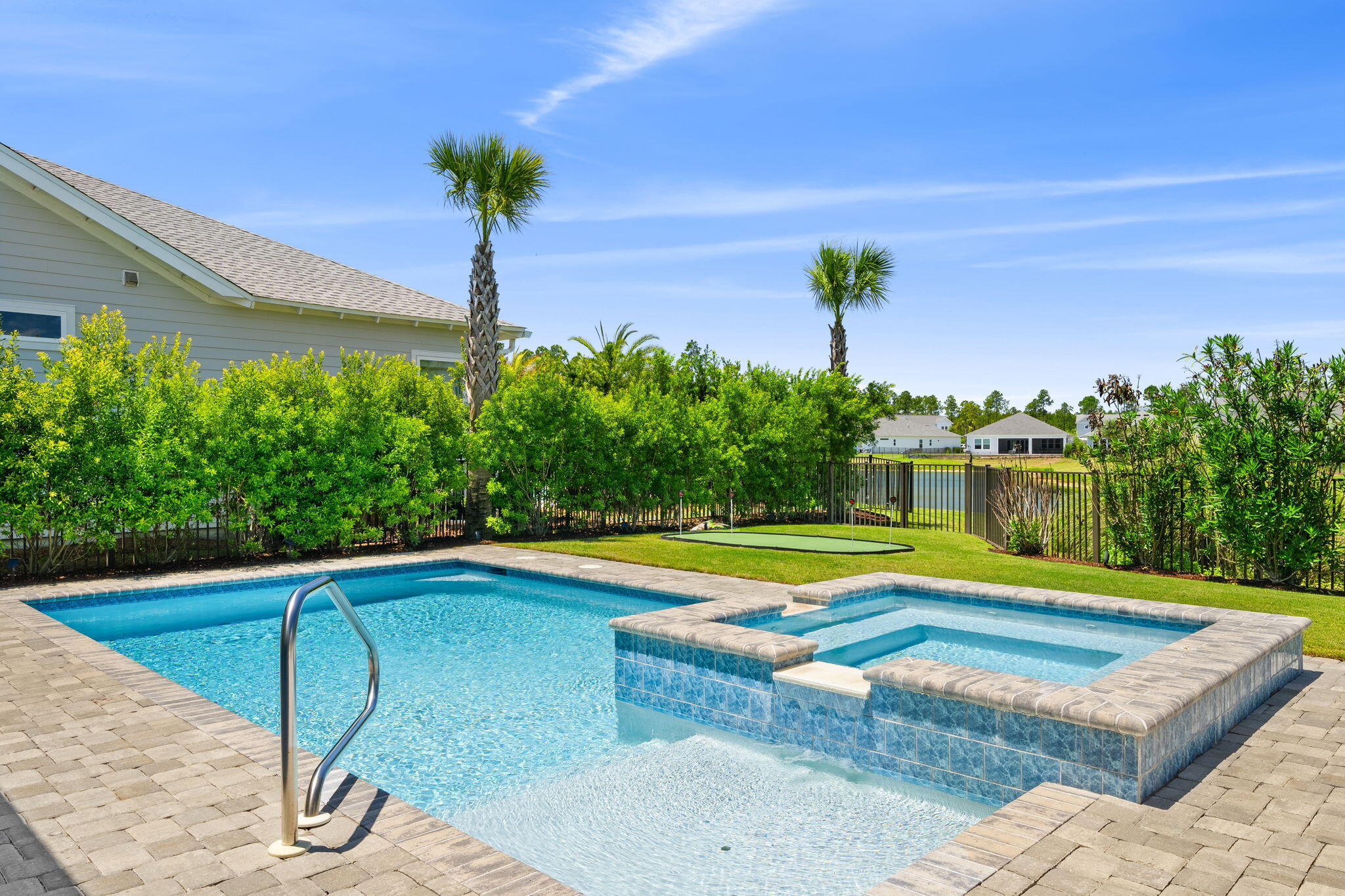 40 Tamoka Ct Inlet Beach Inlet Beach, FL 32461 - Photo 39 of 93 a view of a swimming pool with a yard and seating space